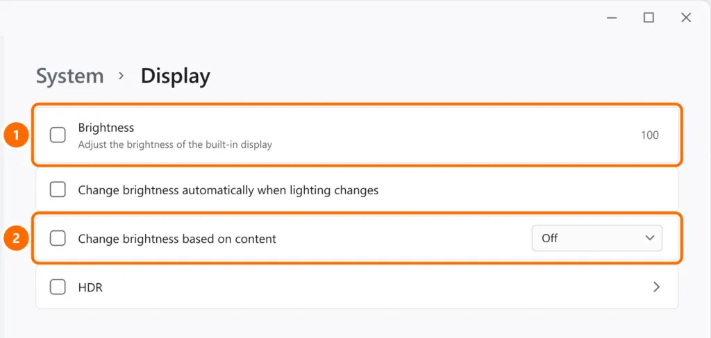 Display settings with brightness at 100 and Change brightness based on content turned off, both highlighted