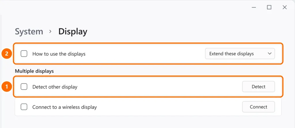 Display settings with the Detect button and Extend these displays option highlighted