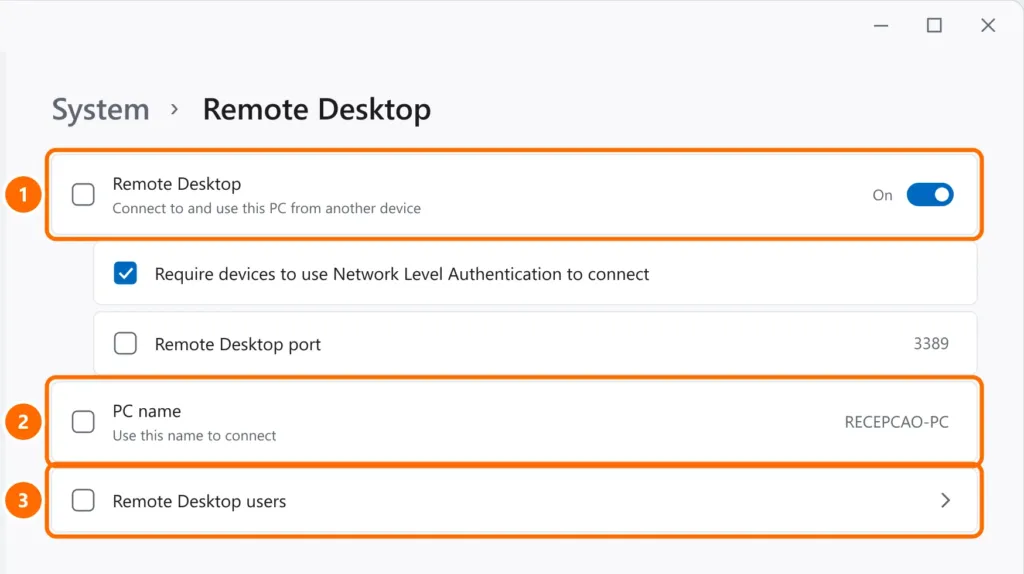 Remote Desktop settings with the toggle on, the PC name and Remote Desktop users highlighted