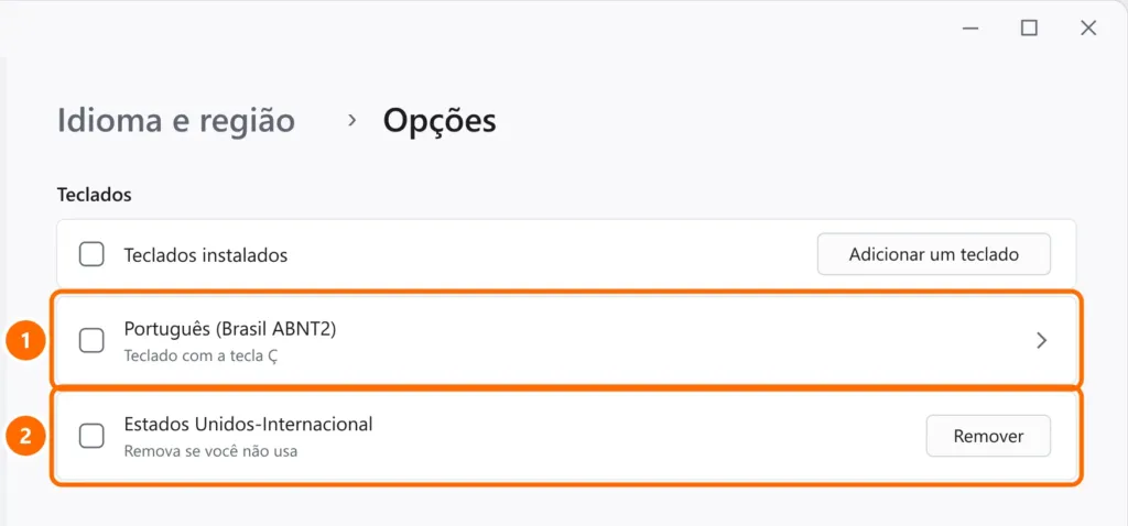 Opções de idioma com os teclados instalados Português (Brasil ABNT2) e Estados Unidos-Internacional, e o botão Remover destacado