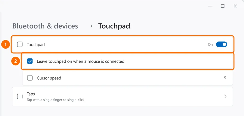 Touchpad settings with the toggle on and the option to leave the touchpad on when a mouse is connected checked and highlighted