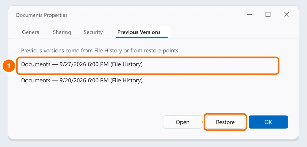 Previous Versions tab of the Documents folder with a File History version selected and the Restore button highlighted